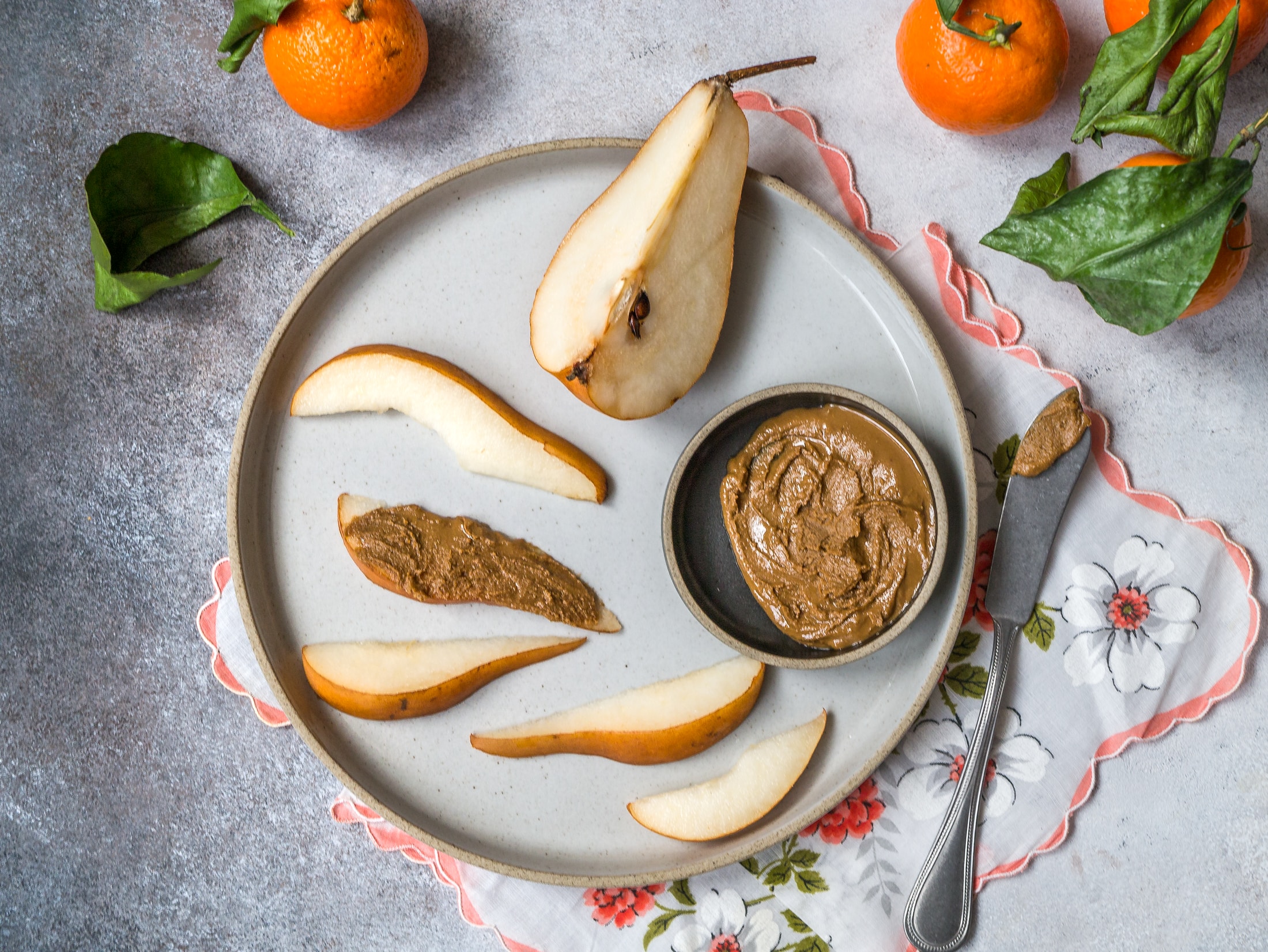 pear and peanut butter on plate