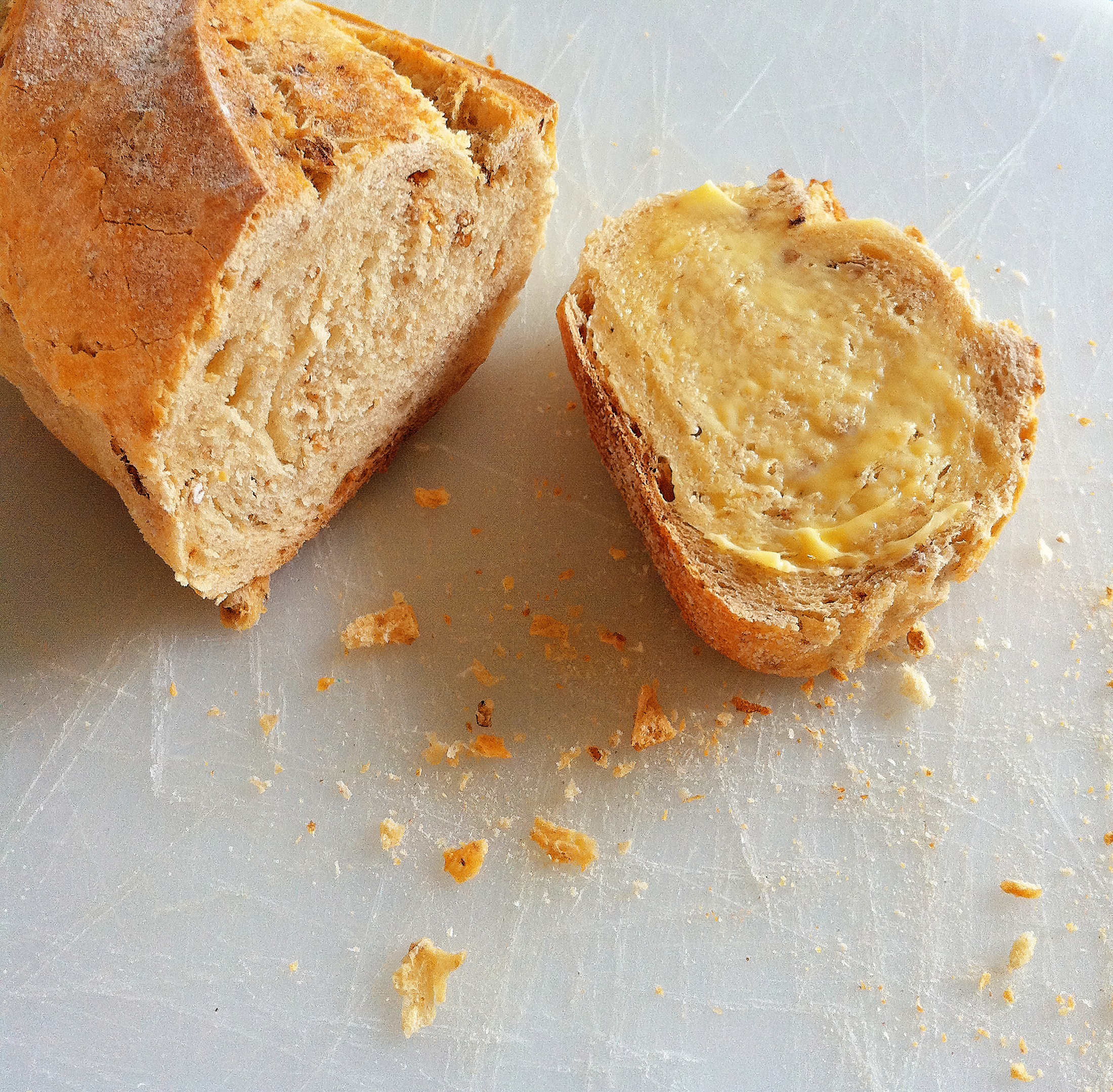 baked bread with yellow cream close-up photography